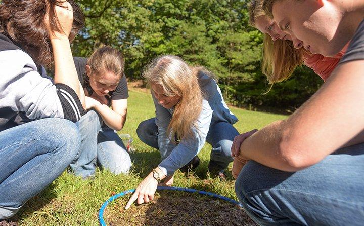 BW professor and students studying earthworms and the environmental factors that determine their distribution